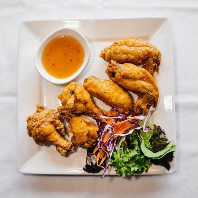 Thai Wings.